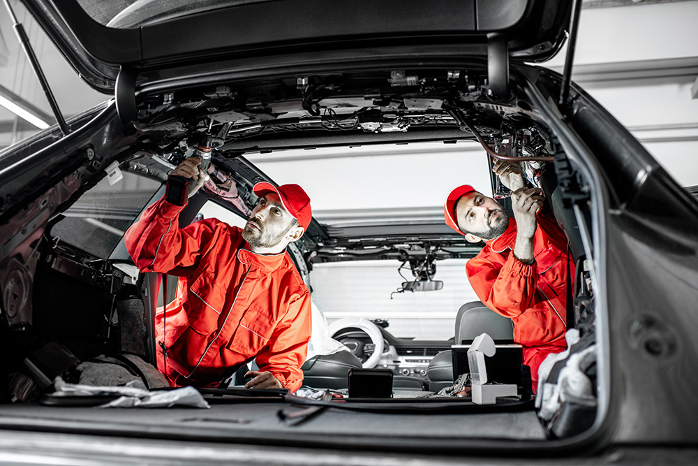 Two-men-repairing-automotive